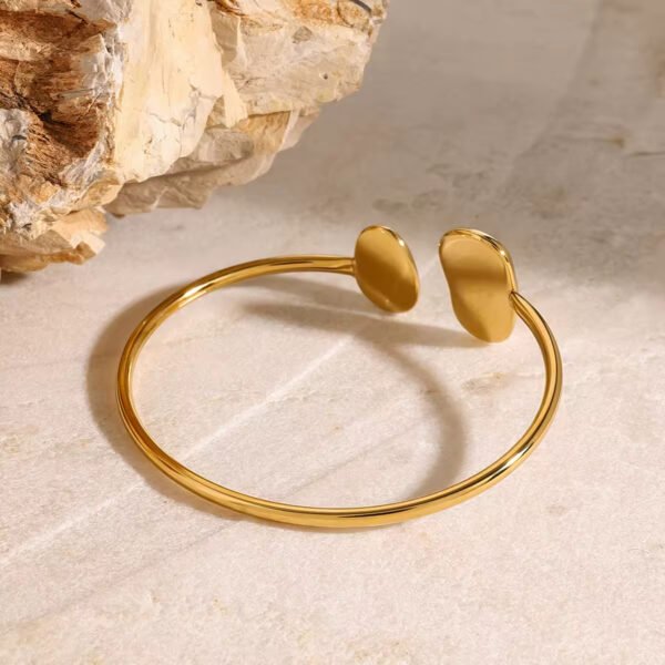 Brazalete Droplets Acero Baño Oro