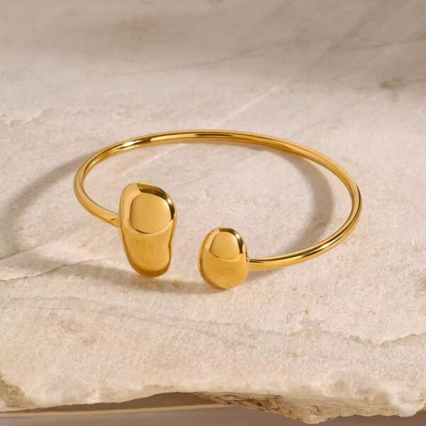 Brazalete Droplets Acero Baño Oro